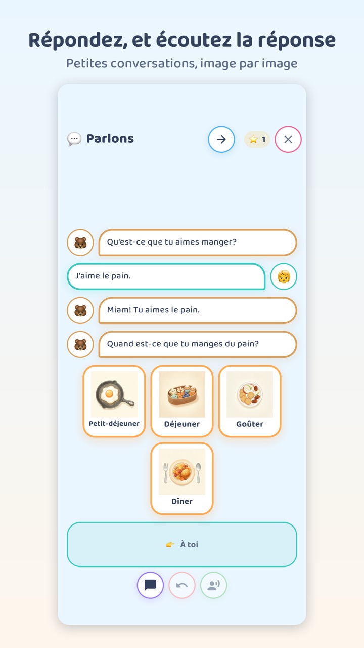 L’écran Parlons dans l’appli : un ourson demande à l’enfant ce qu’il aime manger, l’enfant répond avec une carte, l’ourson lui répond et pose la question suivante, avec des cartes illustrées pour répondre.